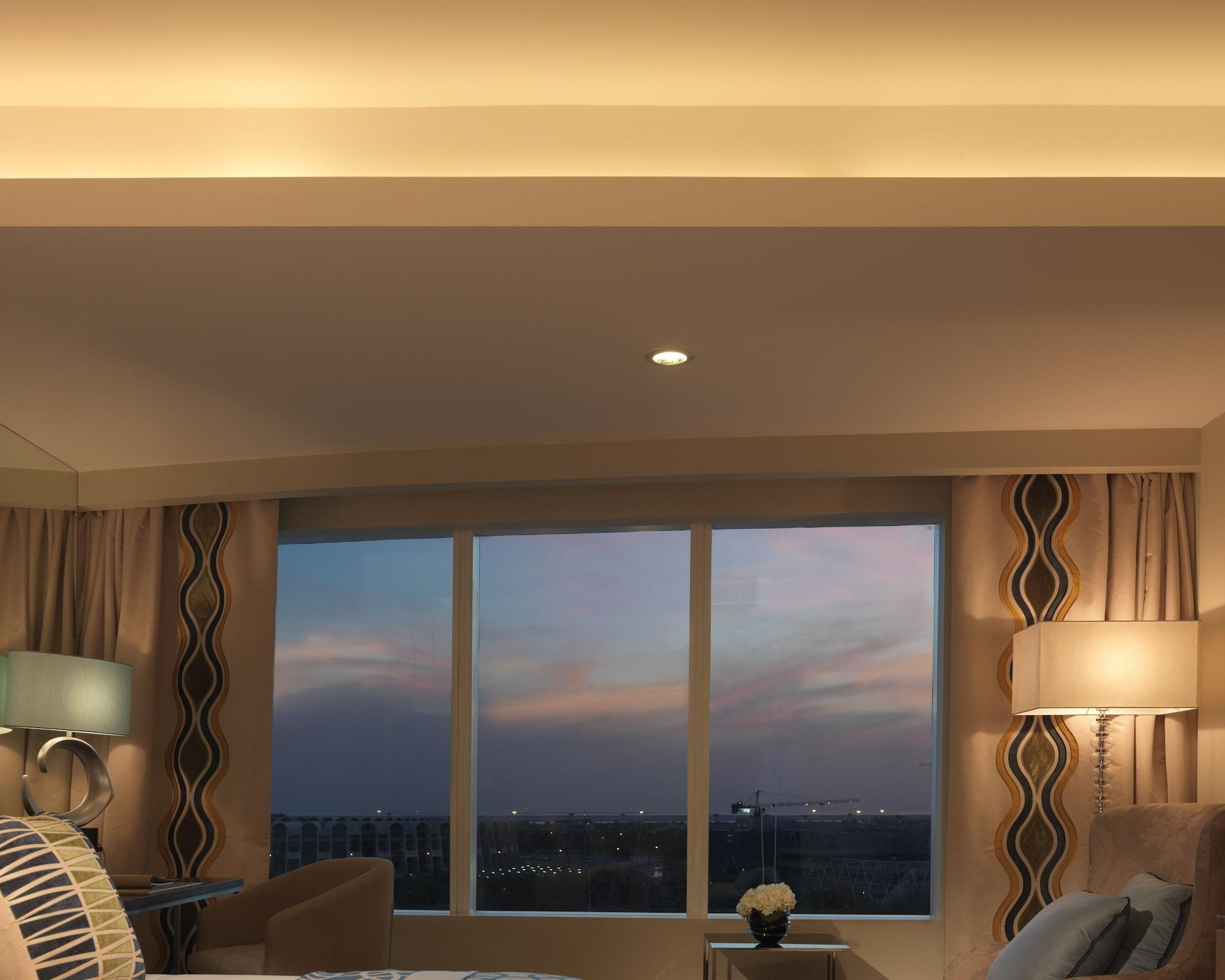 Millennium Al Rawdah Hotel Abu Dhabi Esterno foto A view of the skyline from a room at the Four Seasons Hotel in Seoul, South Korea.