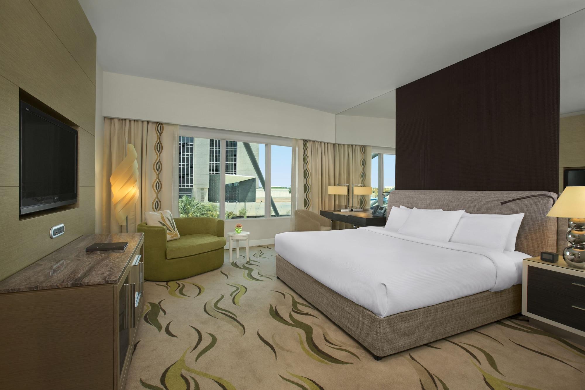 Millennium Al Rawdah Hotel Abu Dhabi Esterno foto A room at the hotel