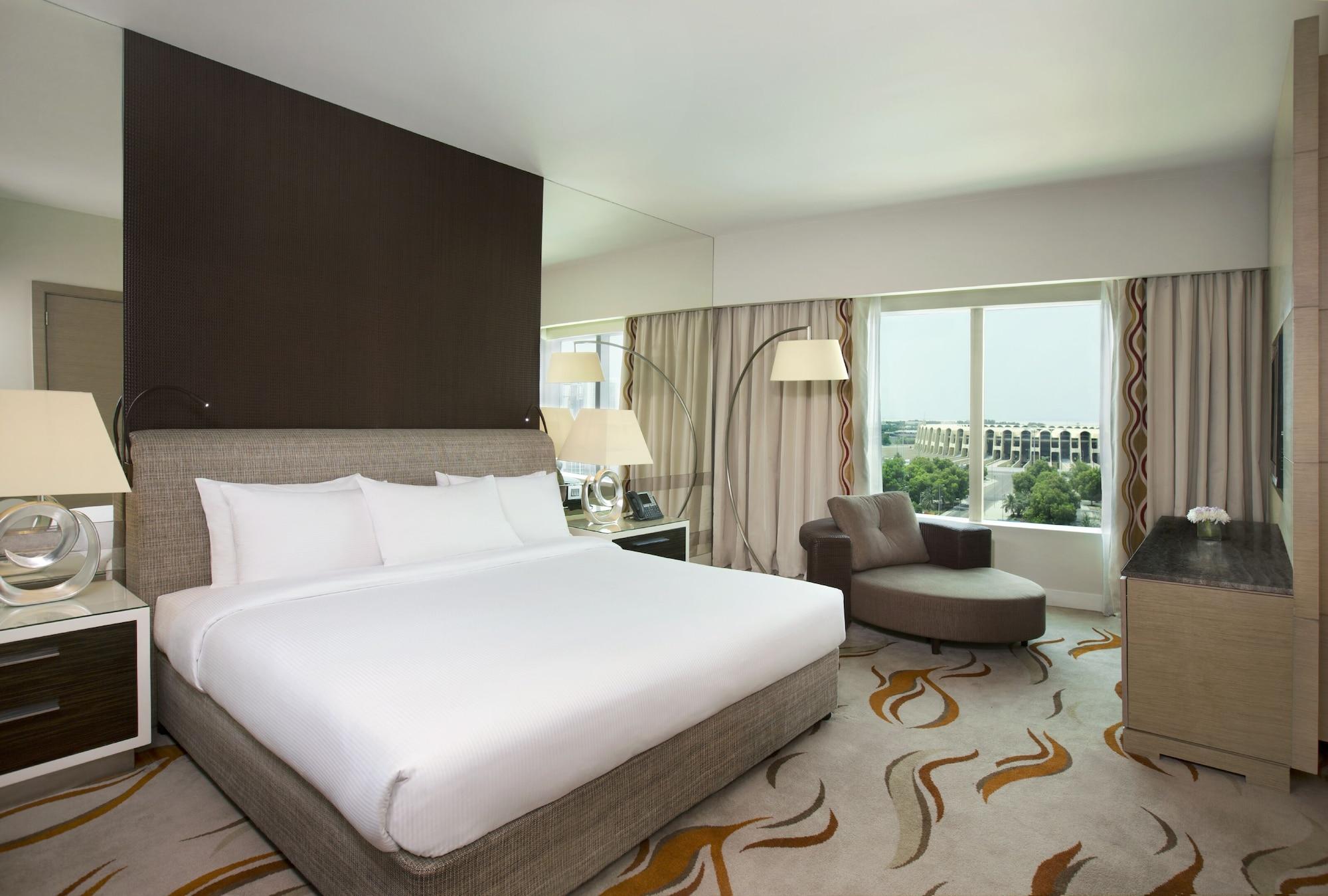 Millennium Al Rawdah Hotel Abu Dhabi Esterno foto A room at the hotel