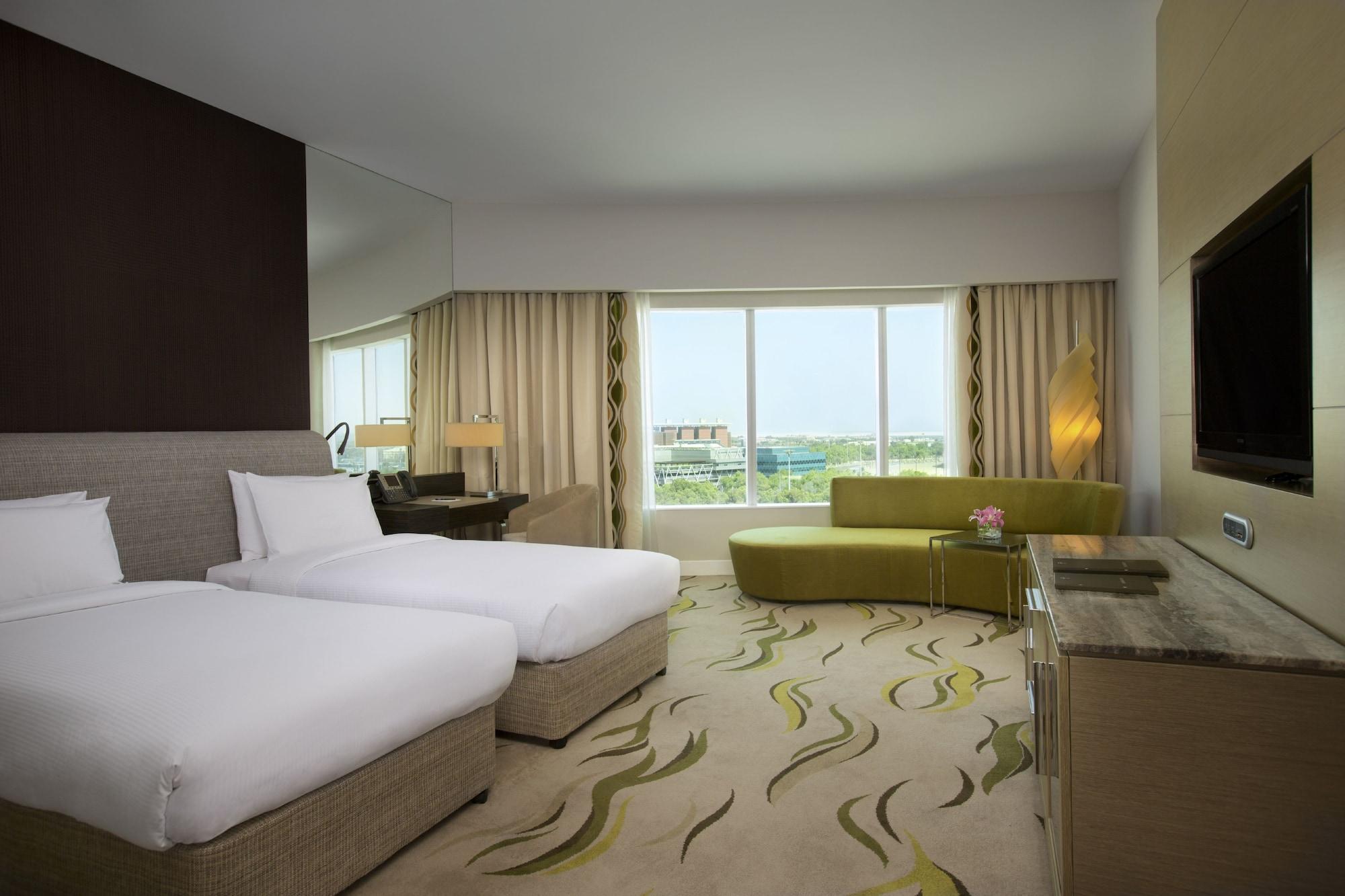 Millennium Al Rawdah Hotel Abu Dhabi Esterno foto A room at the hotel