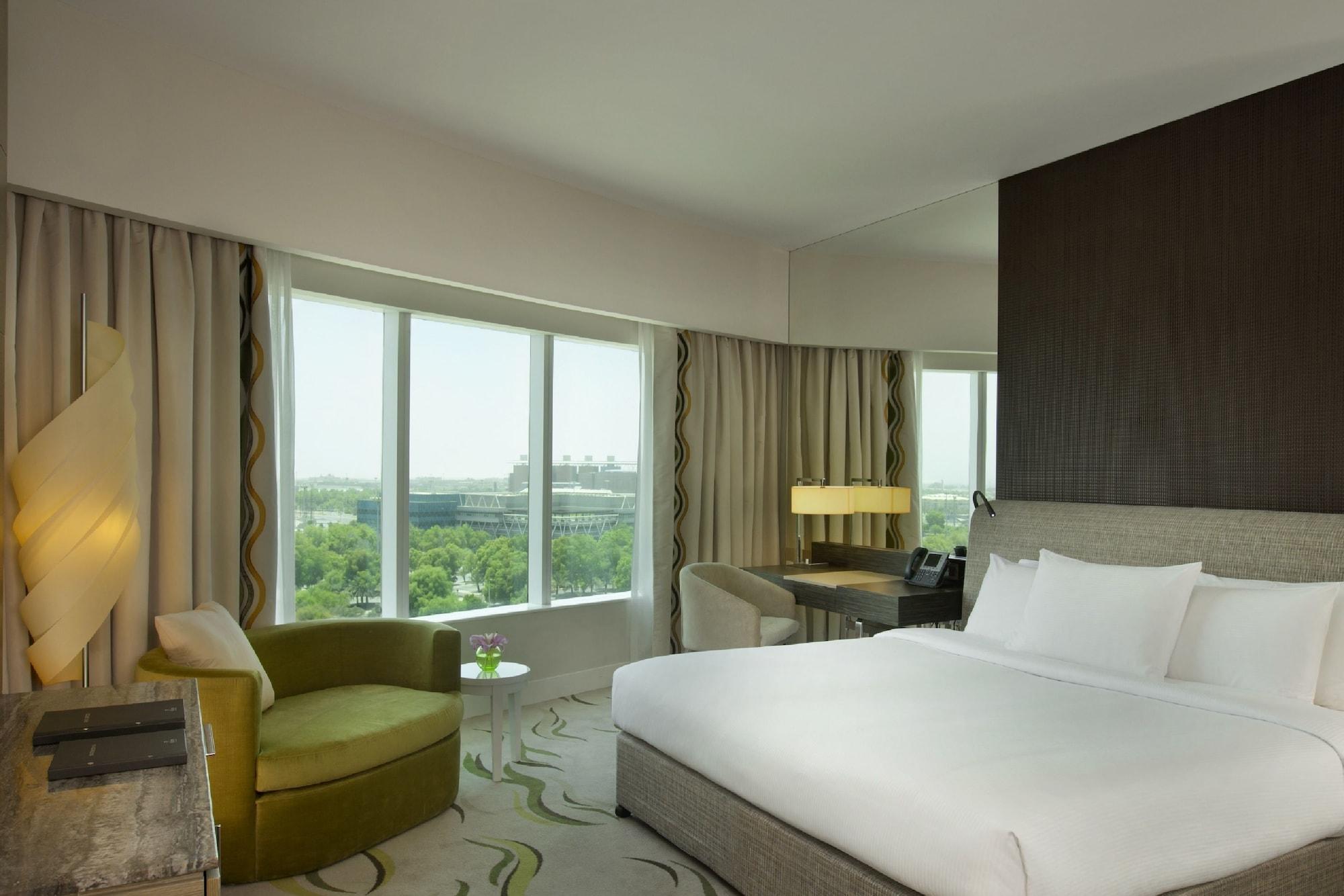 Millennium Al Rawdah Hotel Abu Dhabi Esterno foto A room at the hotel