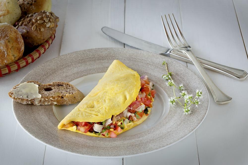 Millennium Al Rawdah Hotel Abu Dhabi Esterno foto Omelette