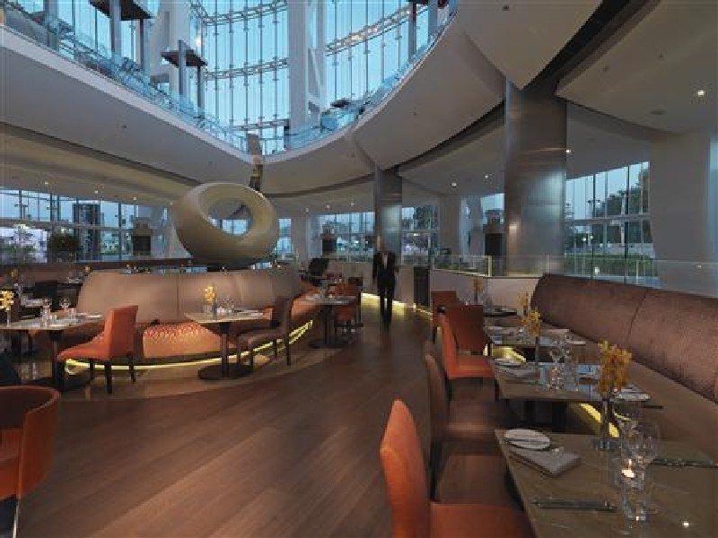 Millennium Al Rawdah Hotel Abu Dhabi Esterno foto The interior of the restaurant
