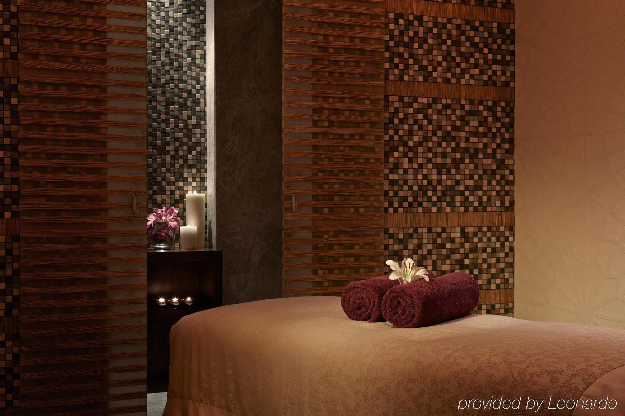 Millennium Al Rawdah Hotel Abu Dhabi Esterno foto A massage table at a luxury spa