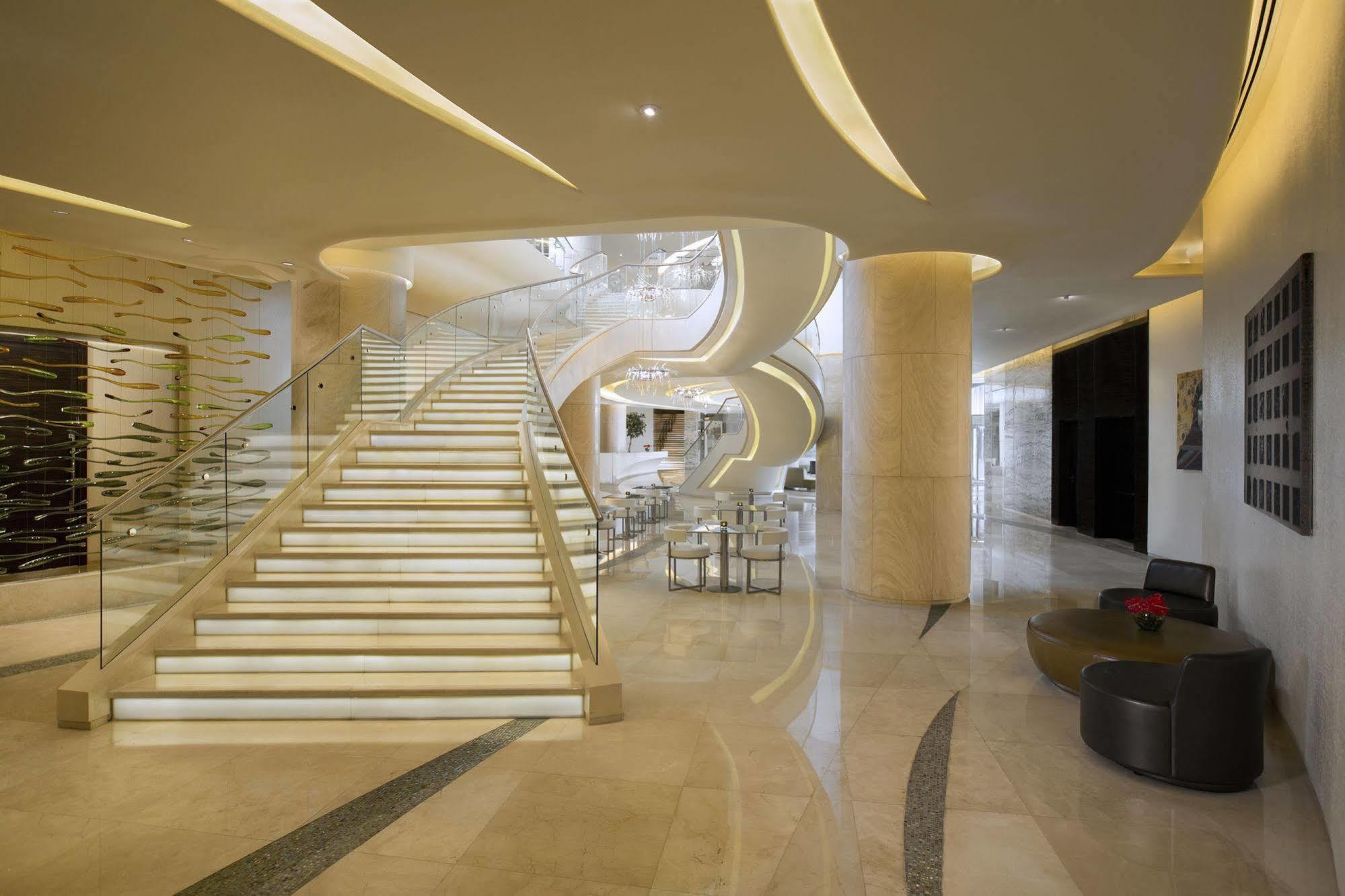 Millennium Al Rawdah Hotel Abu Dhabi Esterno foto The hotel's lobby